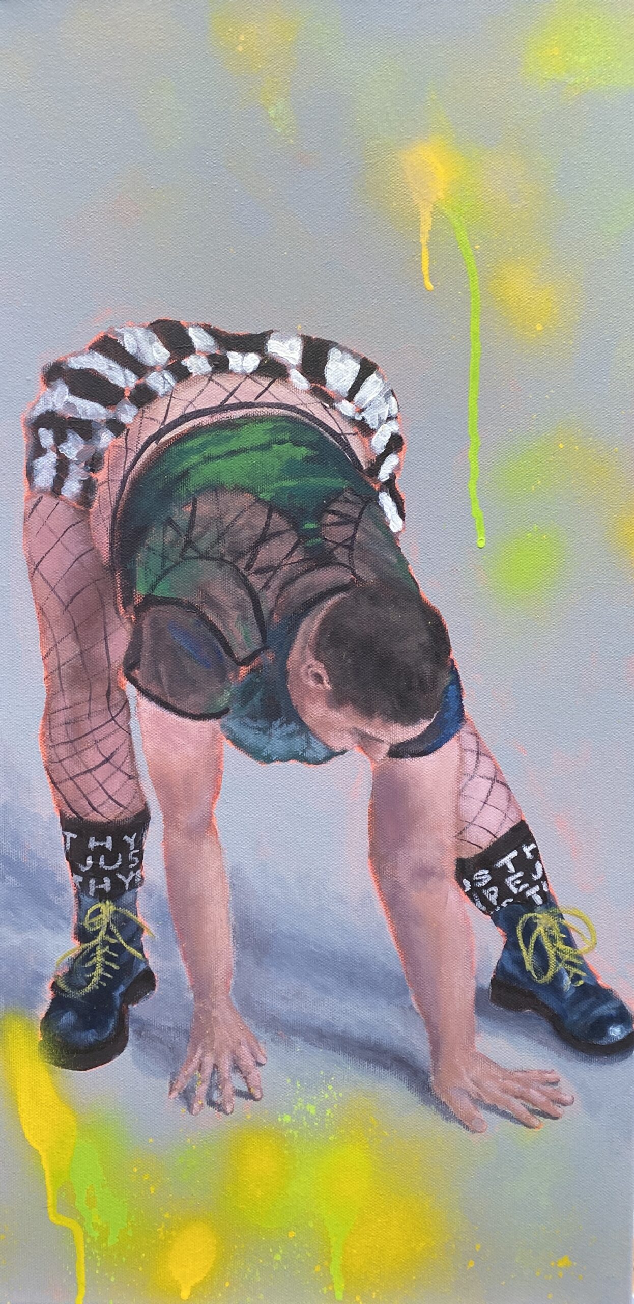 A full length portrait of a person wearing black and white striped shorts and green and black mesh top. The person is bending over and placing their hands on the floor in front of them.